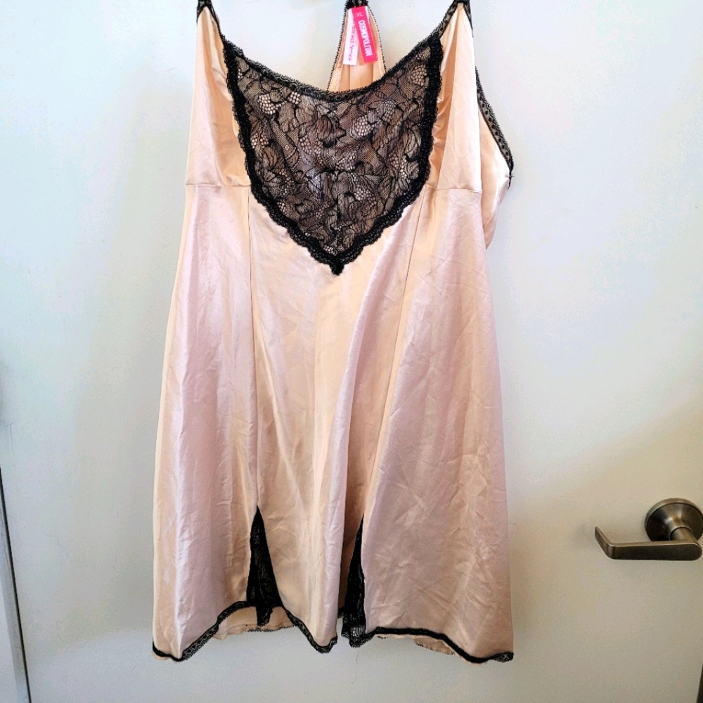 Nude silk lingerie with black lace detail